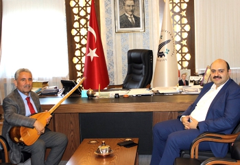 Başkan Orhan’a Halk Ozanı teşekkürü